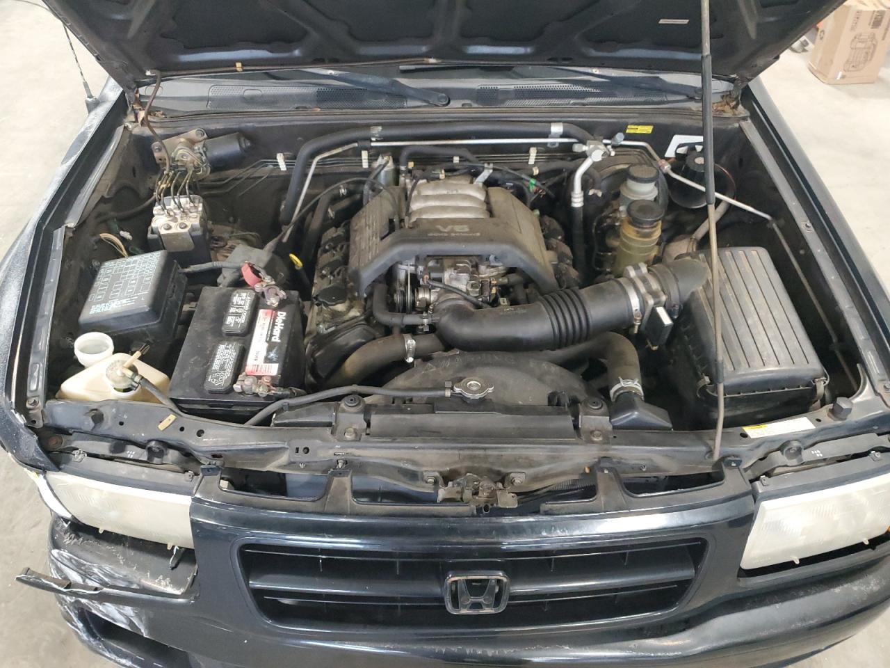 1999 Honda Passport Ex VIN: 4S6CK58WXX4414812 Lot: 61329645