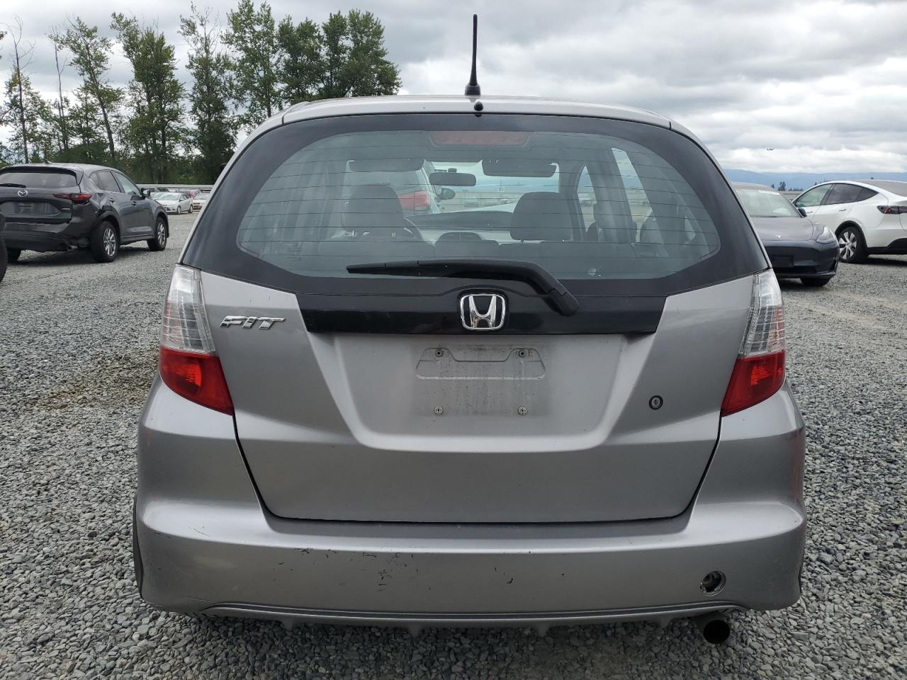 2009 Honda Fit VIN: JHMGE88259S064913 Lot: 62710225