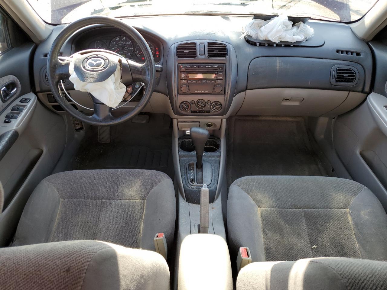 2002 Mazda Protege Dx VIN: JM1BJ225321605590 Lot: 61098175