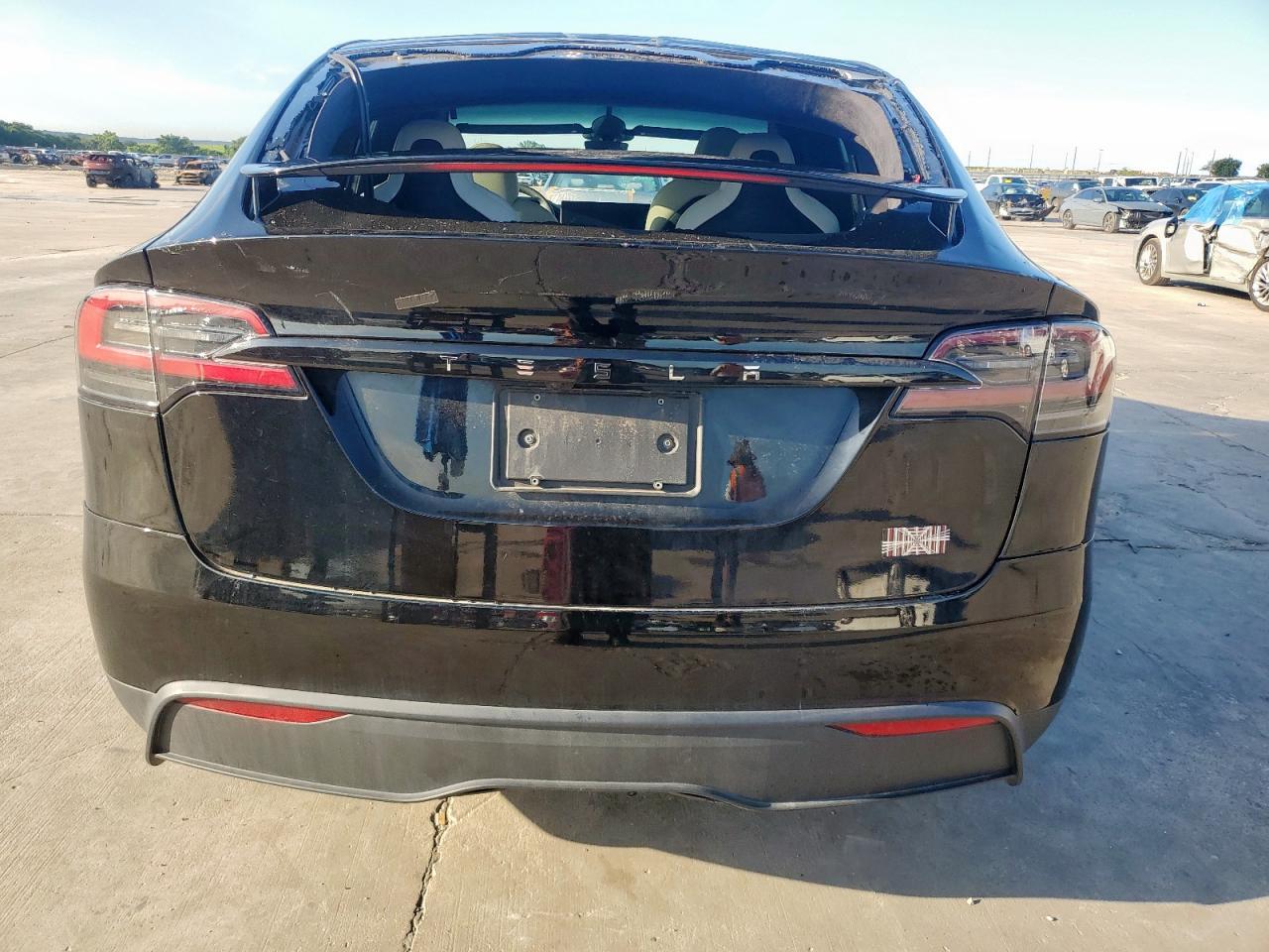 2023 Tesla Model X VIN: 7SAXCBE60PF411282 Lot: 61056975