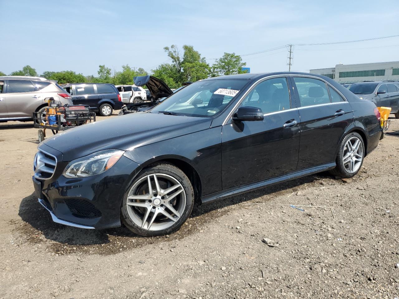 2015 Mercedes-Benz E 400 4Matic black null gas WDDHF6HB6FB163233 photo #1