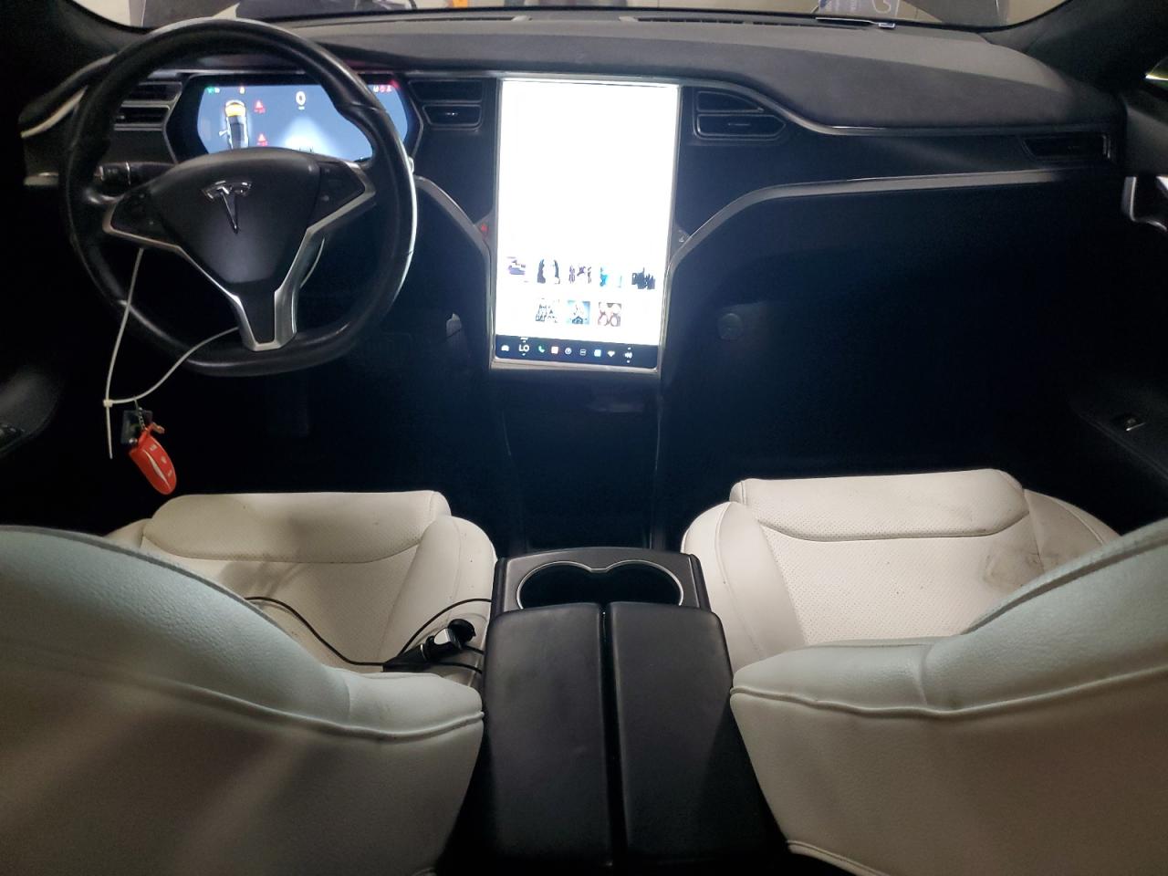 2015 Tesla Model S VIN: 5YJSA1E24FF117516 Lot: 61636465