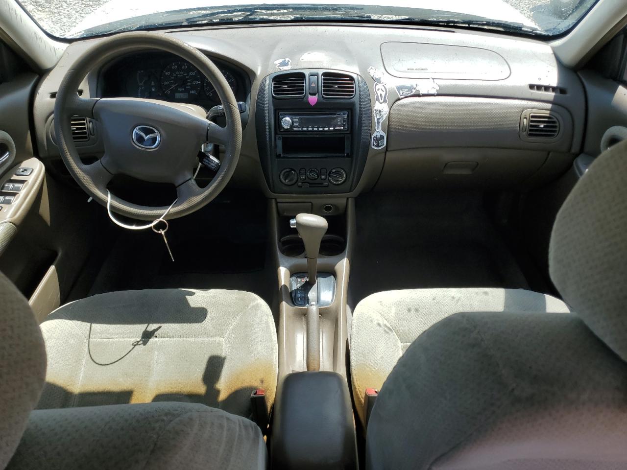 2000 Mazda Protege Dx VIN: JM1BJ2224Y0203582 Lot: 62561055