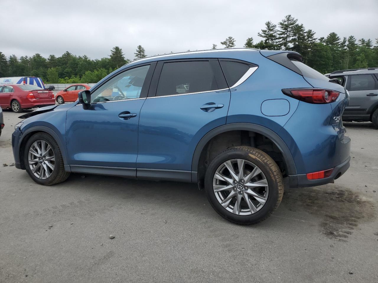 2021 Mazda Cx-5 Grand Touring VIN: JM3KFBDMXM1303701 Lot: 61218225