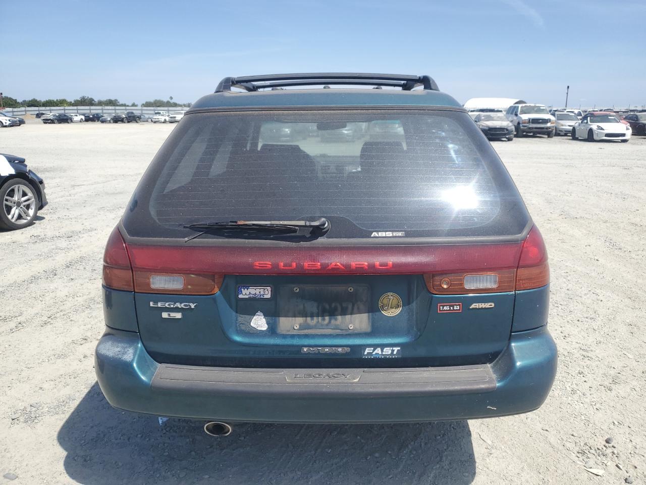 1998 Subaru Legacy L VIN: 4S3BK4354W7300125 Lot: 61473225
