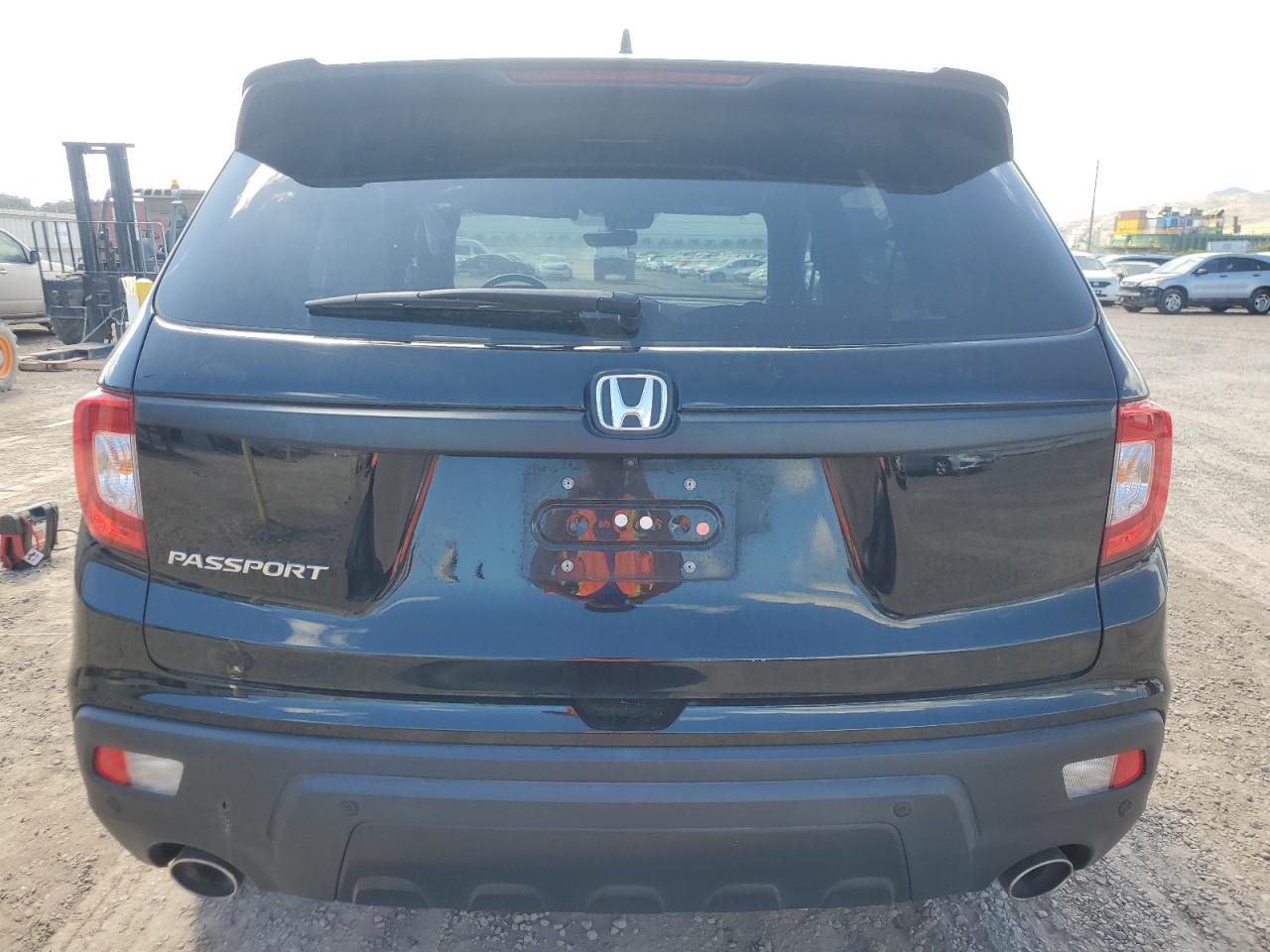 2021 Honda Passport Exl VIN: 5FNYF7H55MB005616 Lot: 61044605
