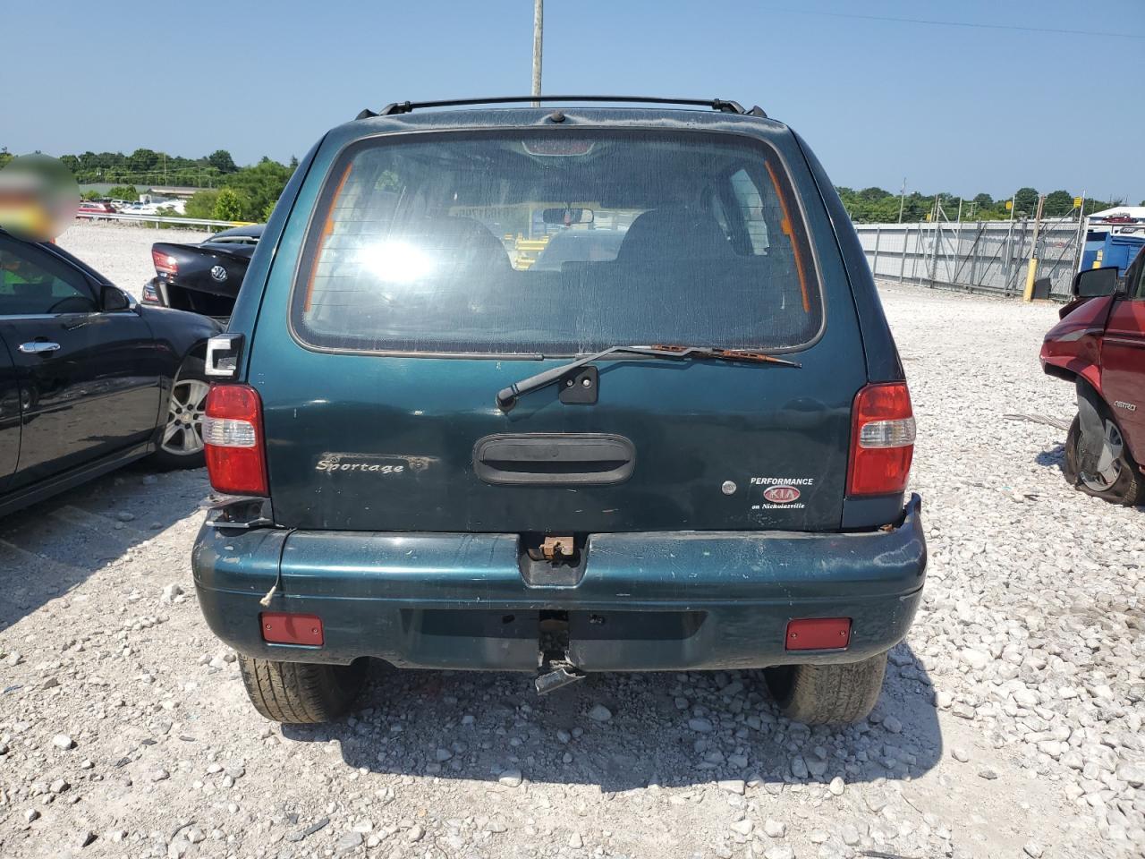2000 Kia Sportage VIN: KNDJA7231Y5675677 Lot: 61031795
