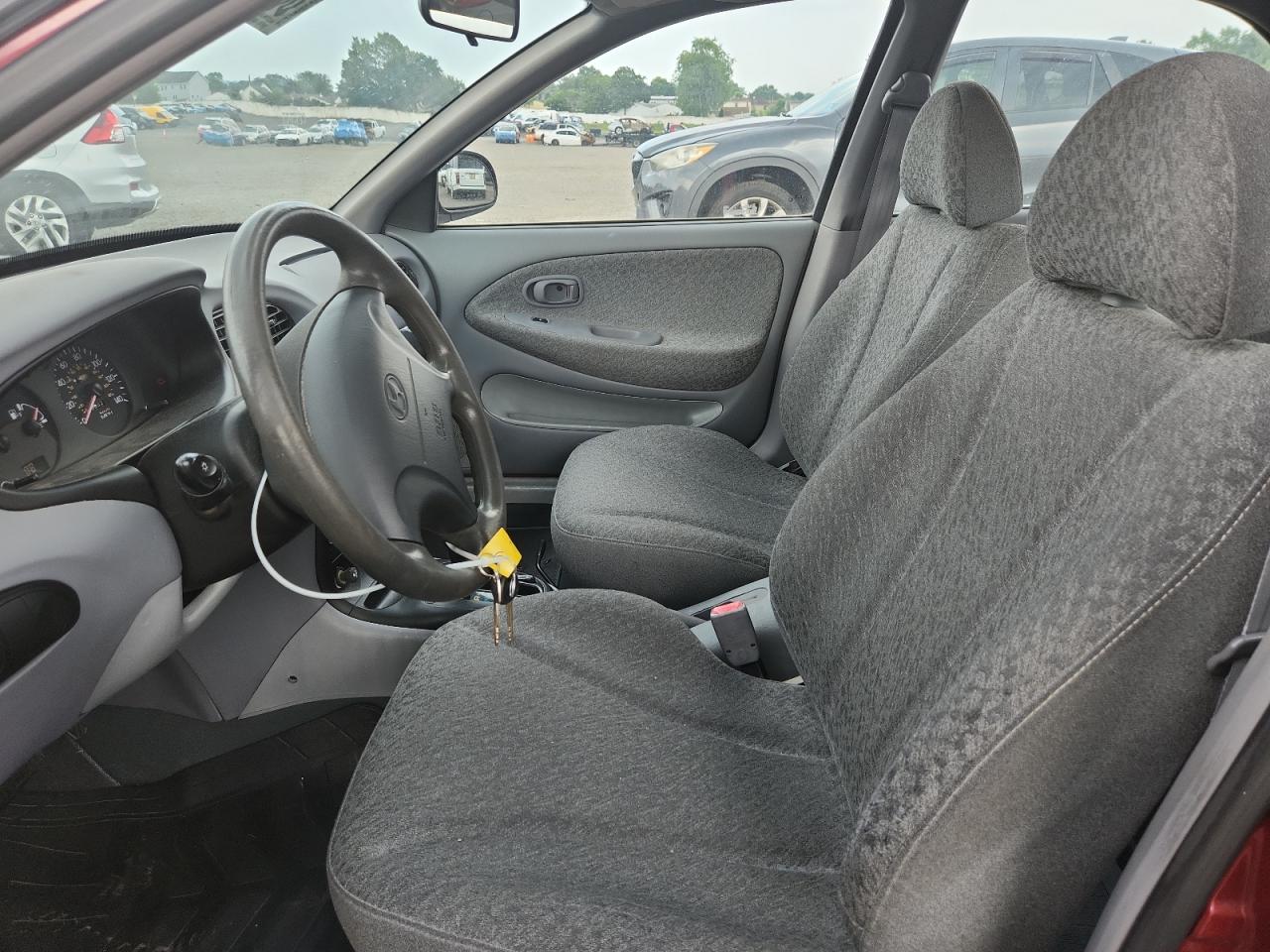 1999 Hyundai Elantra Base VIN: KMHJF25F6XU833540 Lot: 63153215