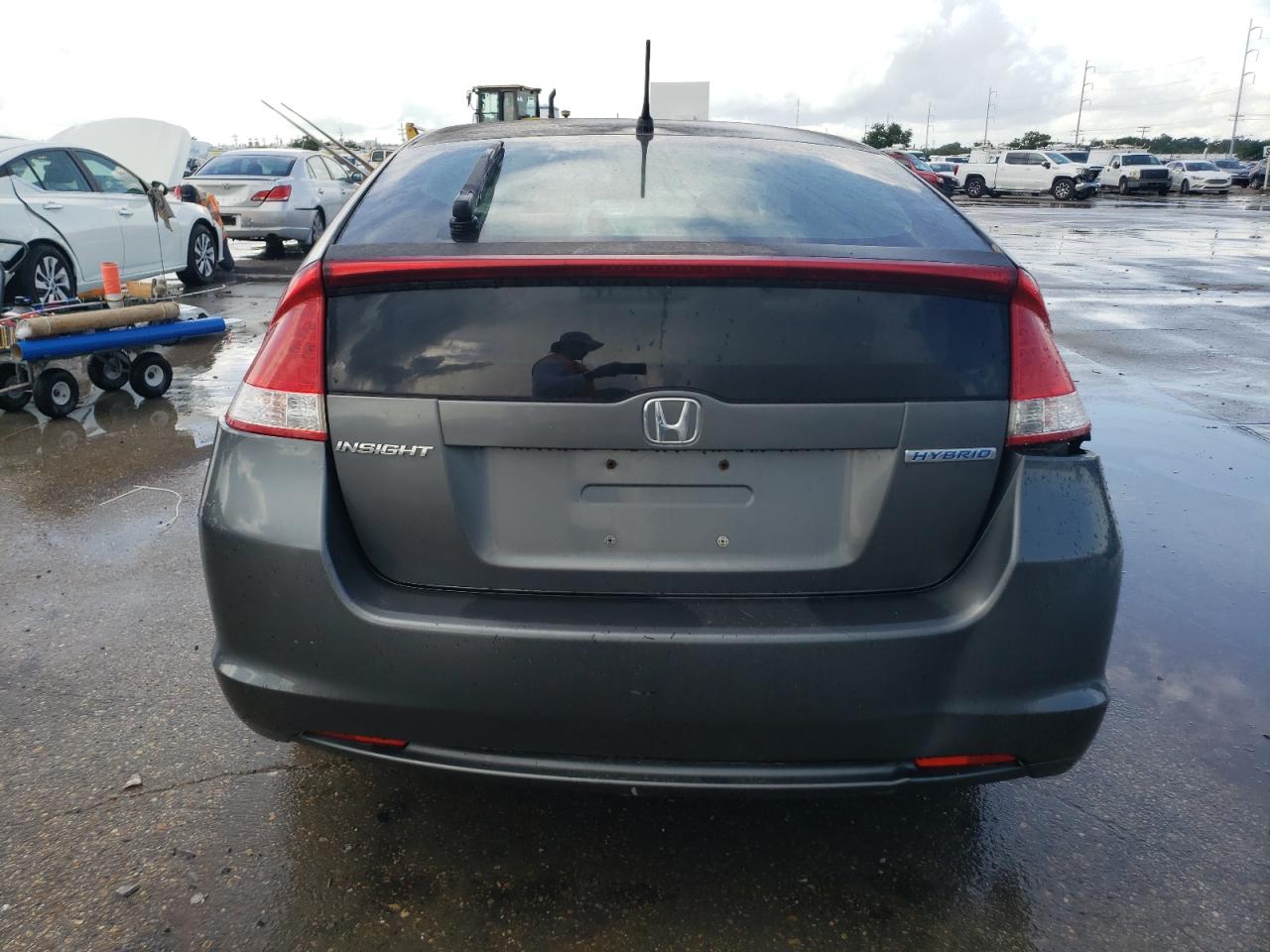 2010 Honda Insight Ex VIN: JHMZE2H77AS032566 Lot: 61204385