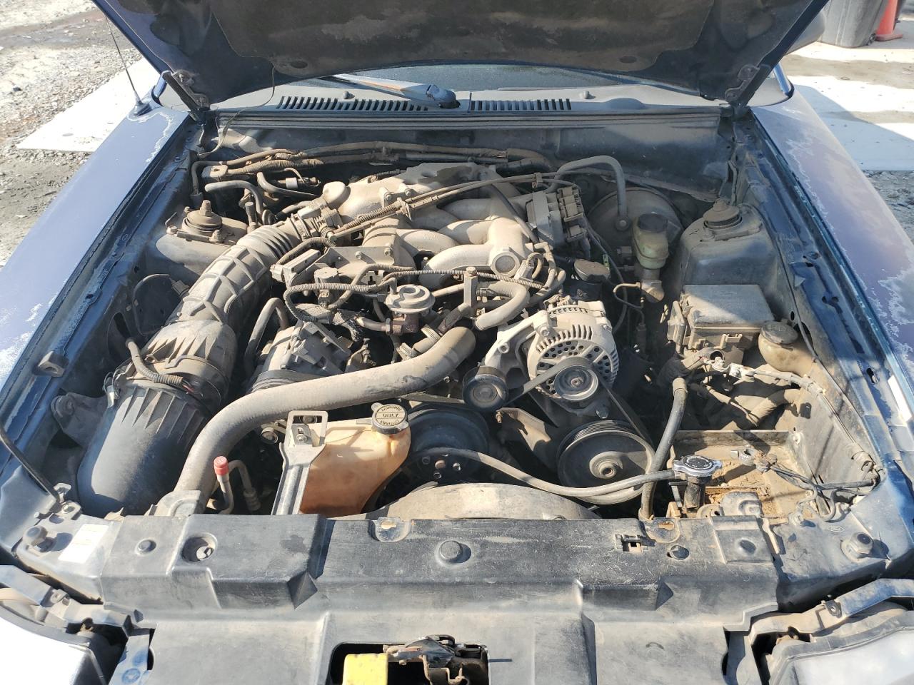 1999 Ford Mustang VIN: 1FAFP4049XF207029 Lot: 60026465