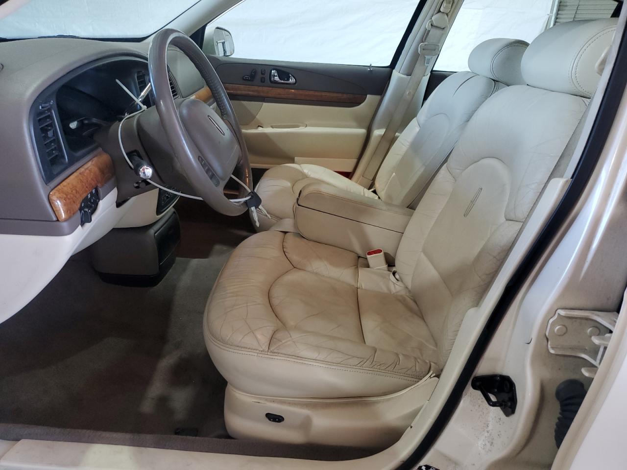 1998 Lincoln Continental VIN: 1LNFM97V8WY704554 Lot: 60099085