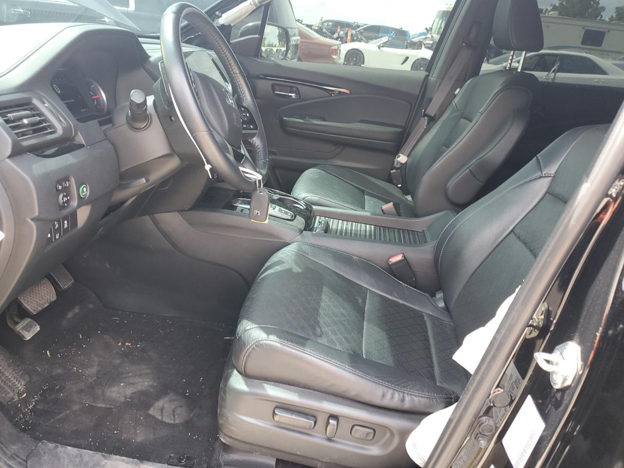 2020 Honda Passport Elite VIN: 5FNYF8H03LB012816 Lot: 60534035