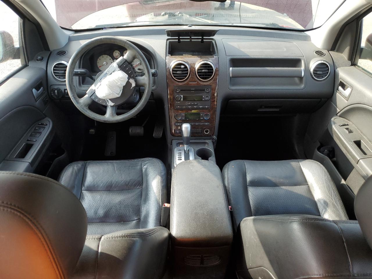 2005 Ford Freestyle Limited VIN: 1FMDK06185GA74112 Lot: 59987755