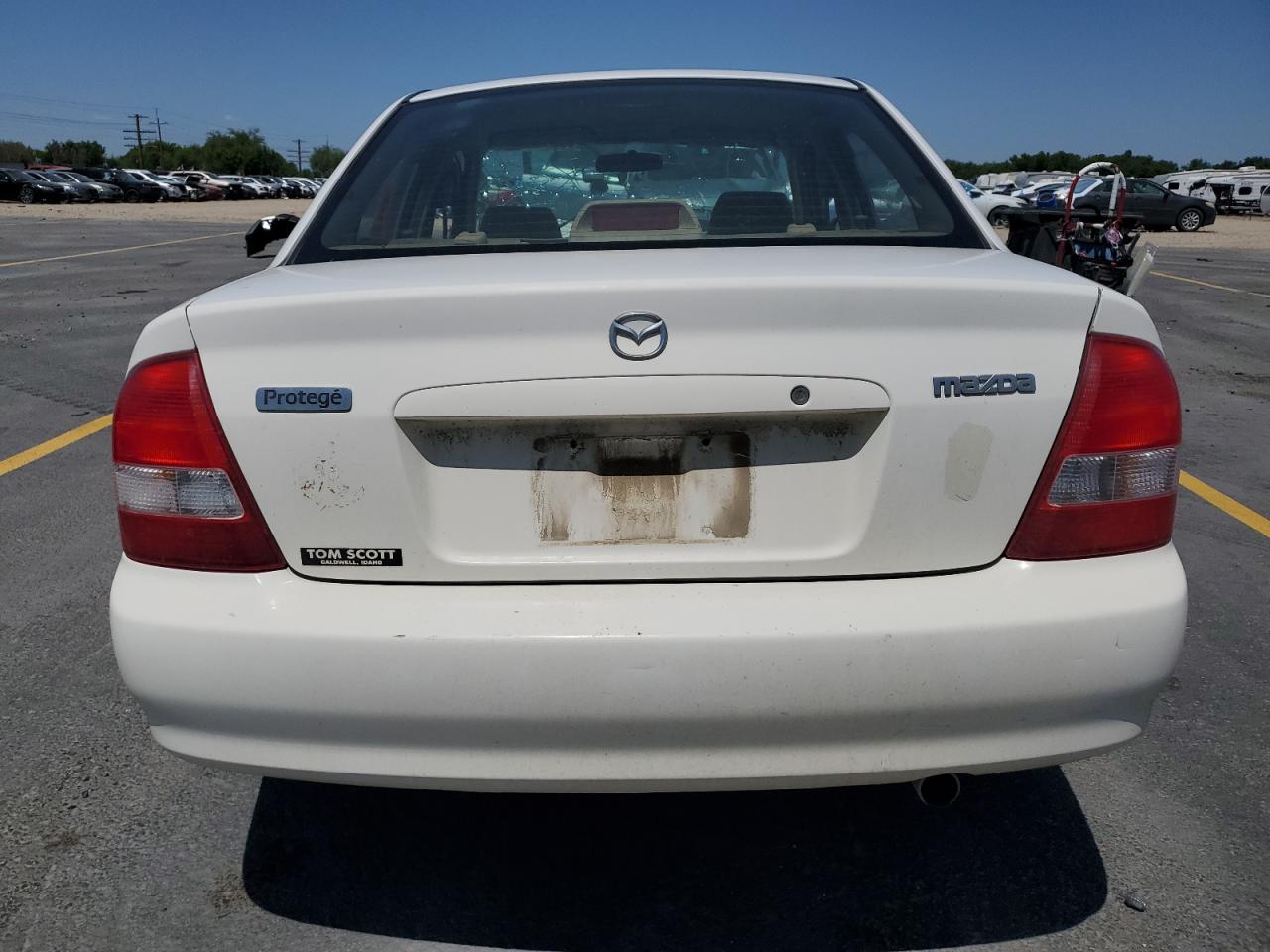 2000 Mazda Protege Dx VIN: JM1BJ2224Y0303231 Lot: 60853845
