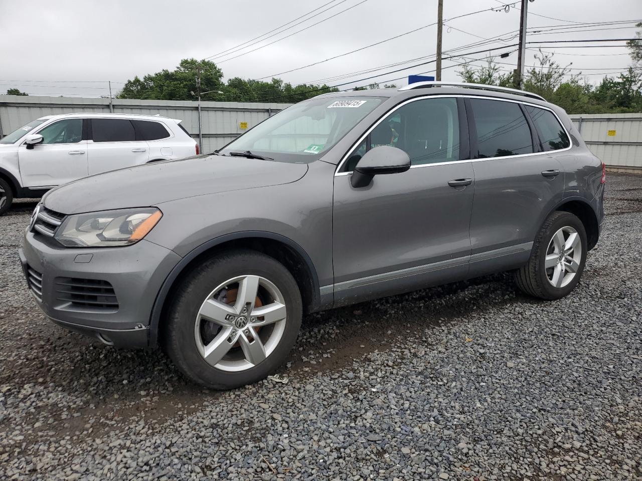 WVGFF9BP3CD000431 VOLKSWAGEN TOUAREG Photo 1