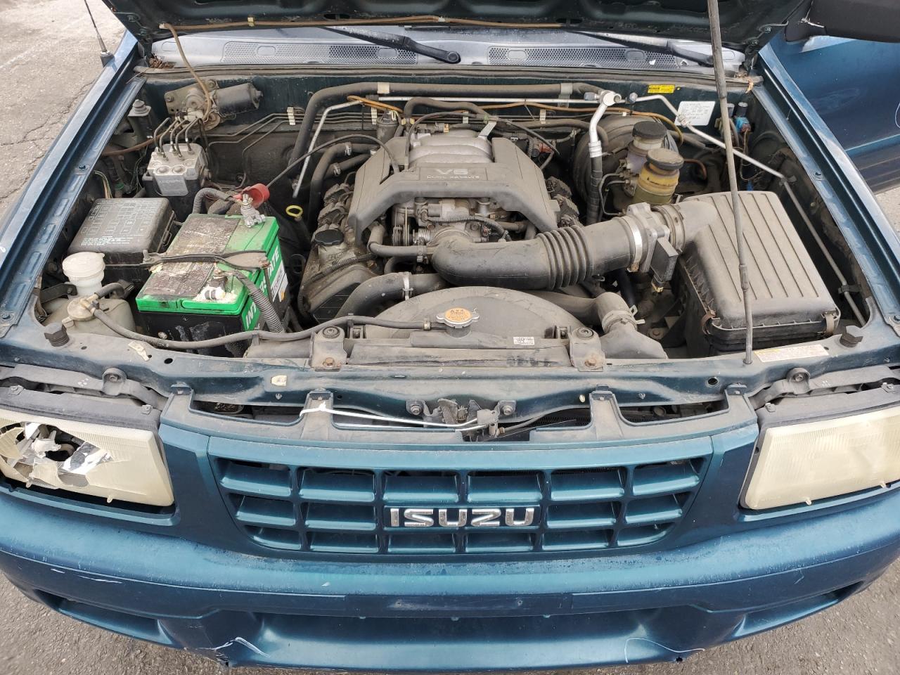 1999 Isuzu Rodeo S VIN: 4S2CM58W5X4313060 Lot: 62211235