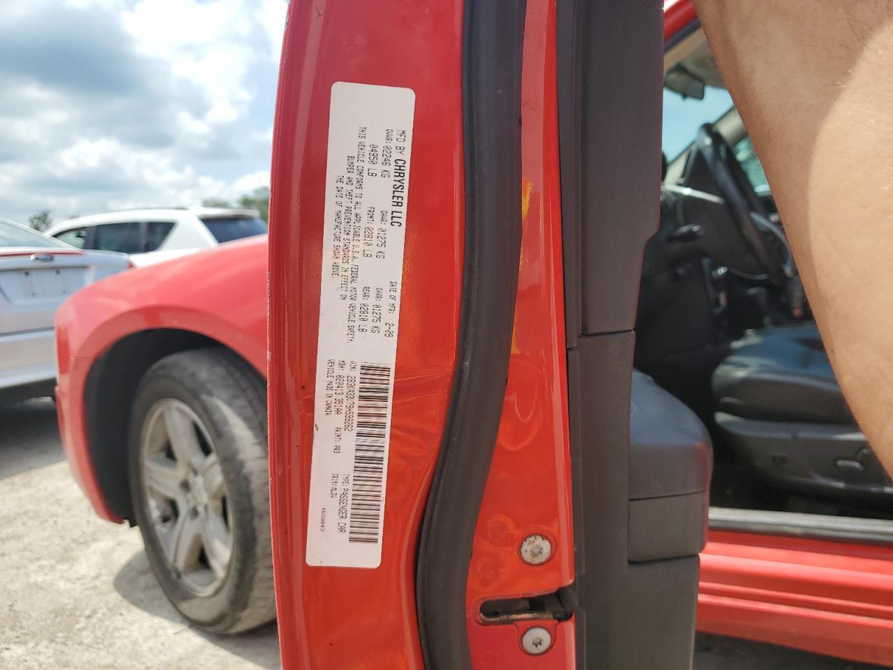 2009 Dodge Charger Sxt VIN: 2B3KA33V79H599262 Lot: 61385885