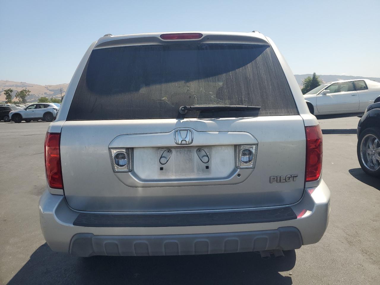 2004 Honda Pilot Exl VIN: 2HKYF18744H604779 Lot: 62360485