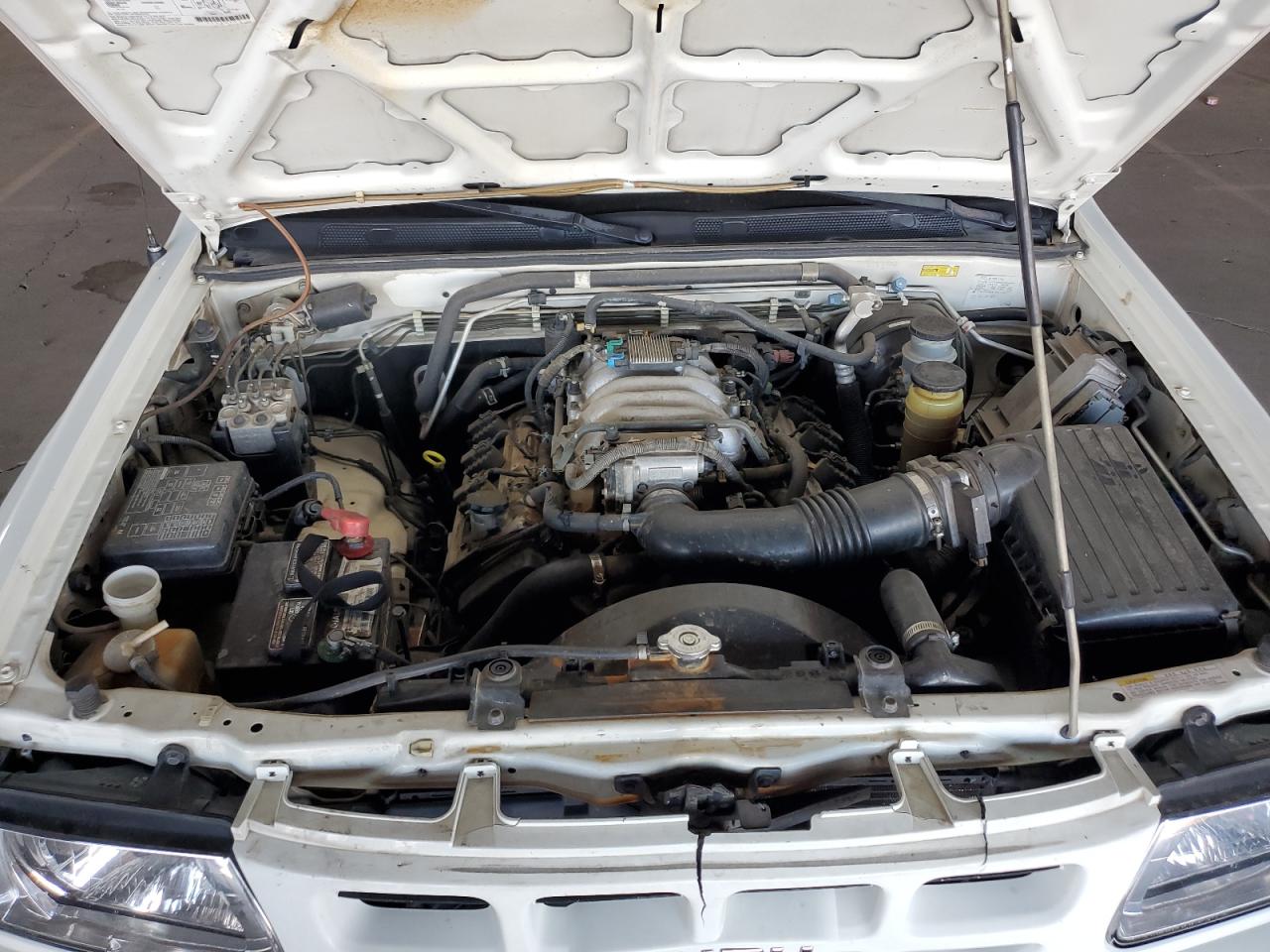 2000 Isuzu Rodeo S VIN: 4S2CK58W3Y4323965 Lot: 61189435