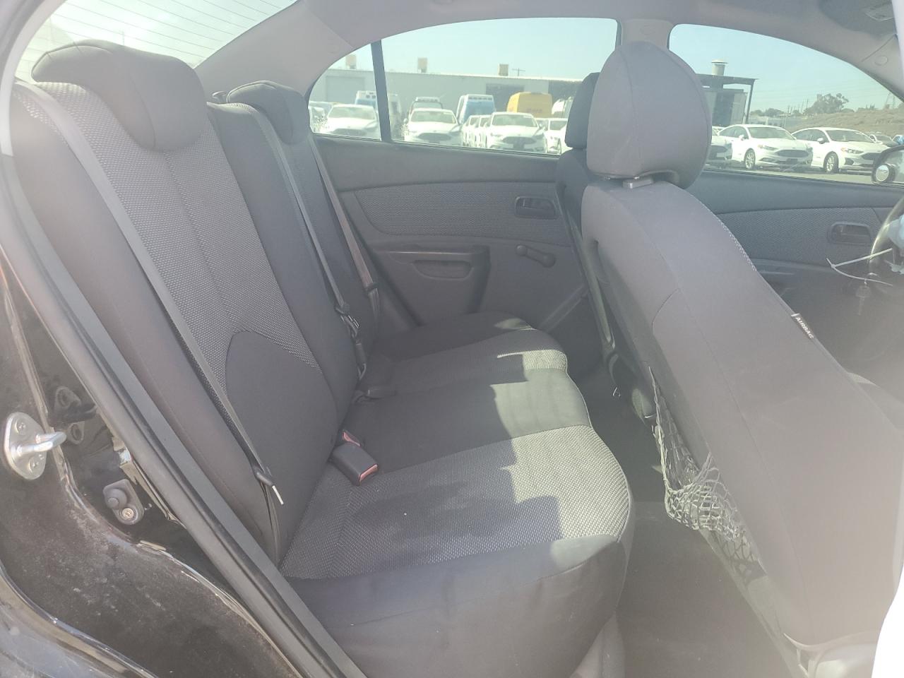 2009 Kia Rio Base VIN: KNADE223496584674 Lot: 62762945