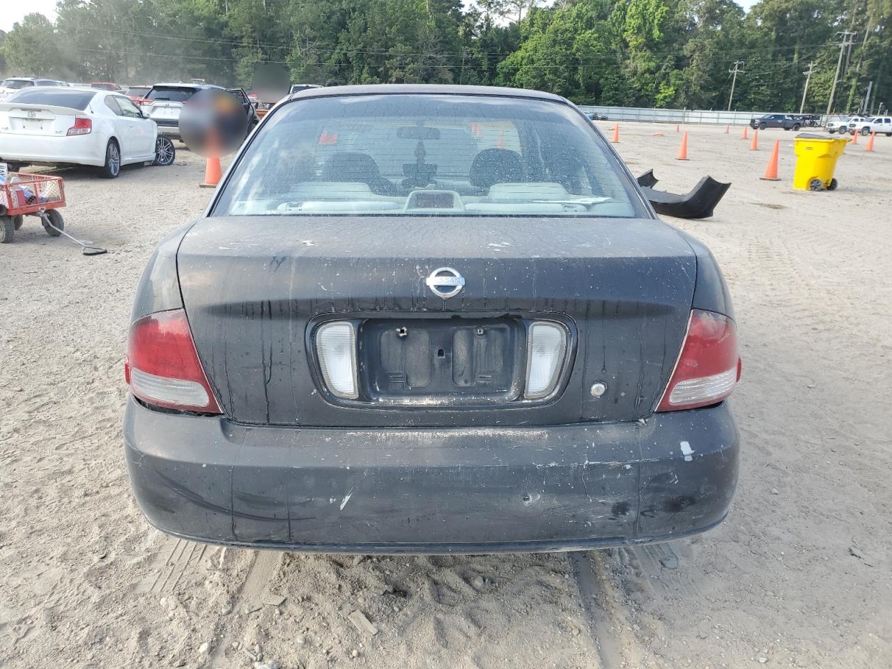 2003 Nissan Sentra Xe VIN: 3N1CB51D23L707617 Lot: 59322055