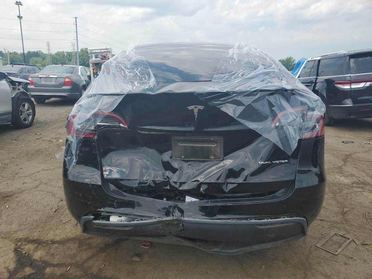 2023 Tesla Model Y VIN: 7SAYGDEE9PF830985 Lot: 62294575