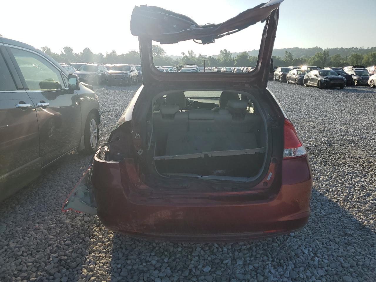 2010 Honda Insight Ex VIN: JHMZE2H7XAS018869 Lot: 61204185