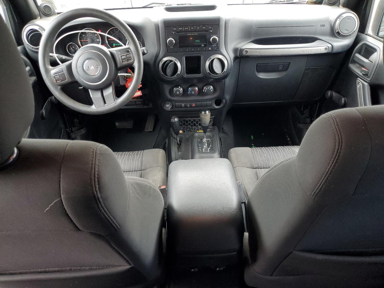 2012 Jeep Wrangler Unlimited Sport VIN: 1C4BJWDG3CL200048 Lot: 62724985
