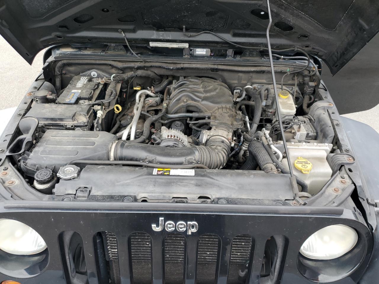 2012 Jeep Wrangler Unlimited Sport VIN: 1C4BJWDG3CL200048 Lot: 62724985