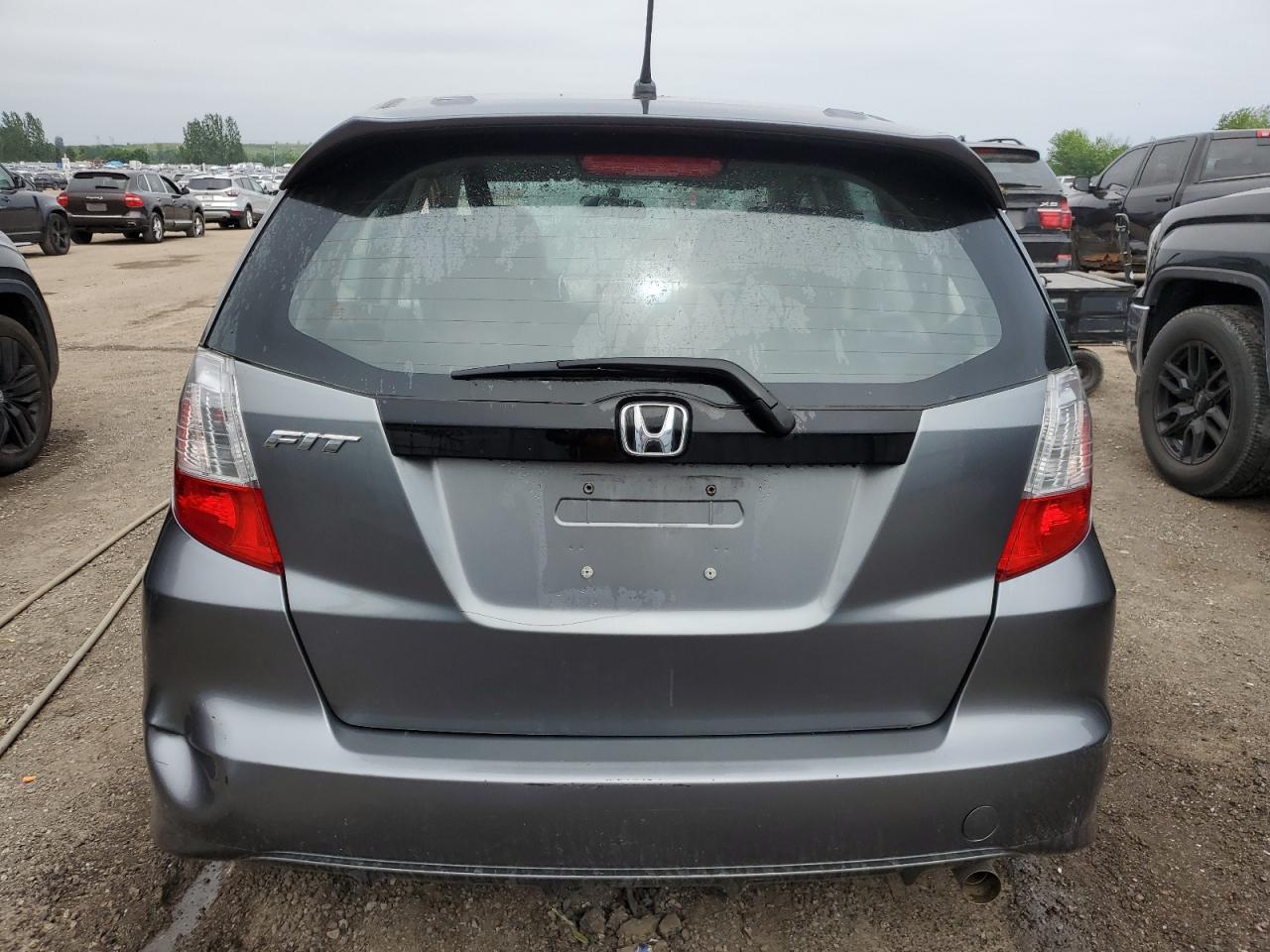 2013 Honda Fit Lx VIN: LUCGE8H52D3009295 Lot: 62182005