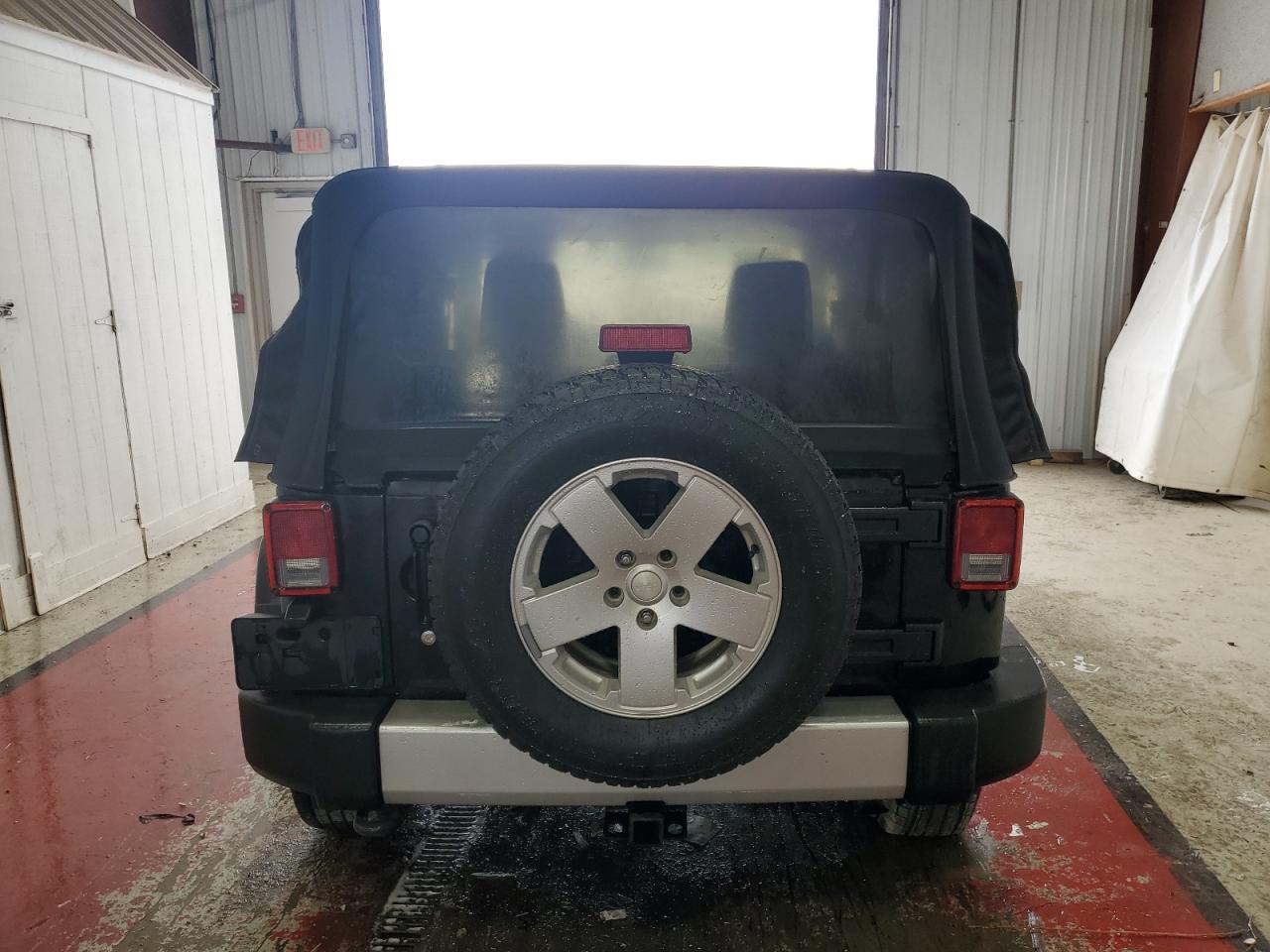 2011 Jeep Wrangler Sahara VIN: 1J4AA5D18BL606384 Lot: 61341025