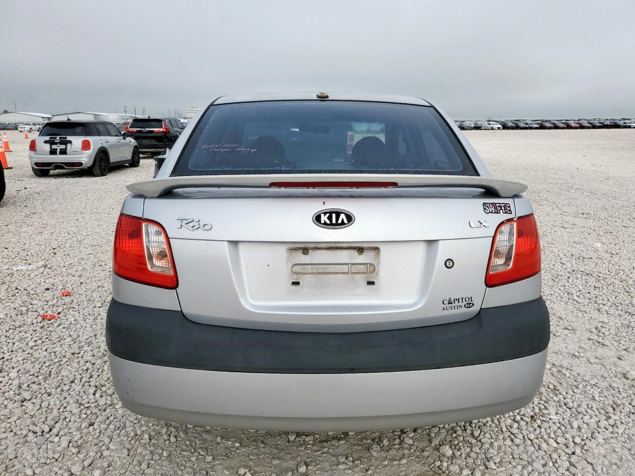 2009 Kia Rio Base VIN: KNADE223396458595 Lot: 62408455