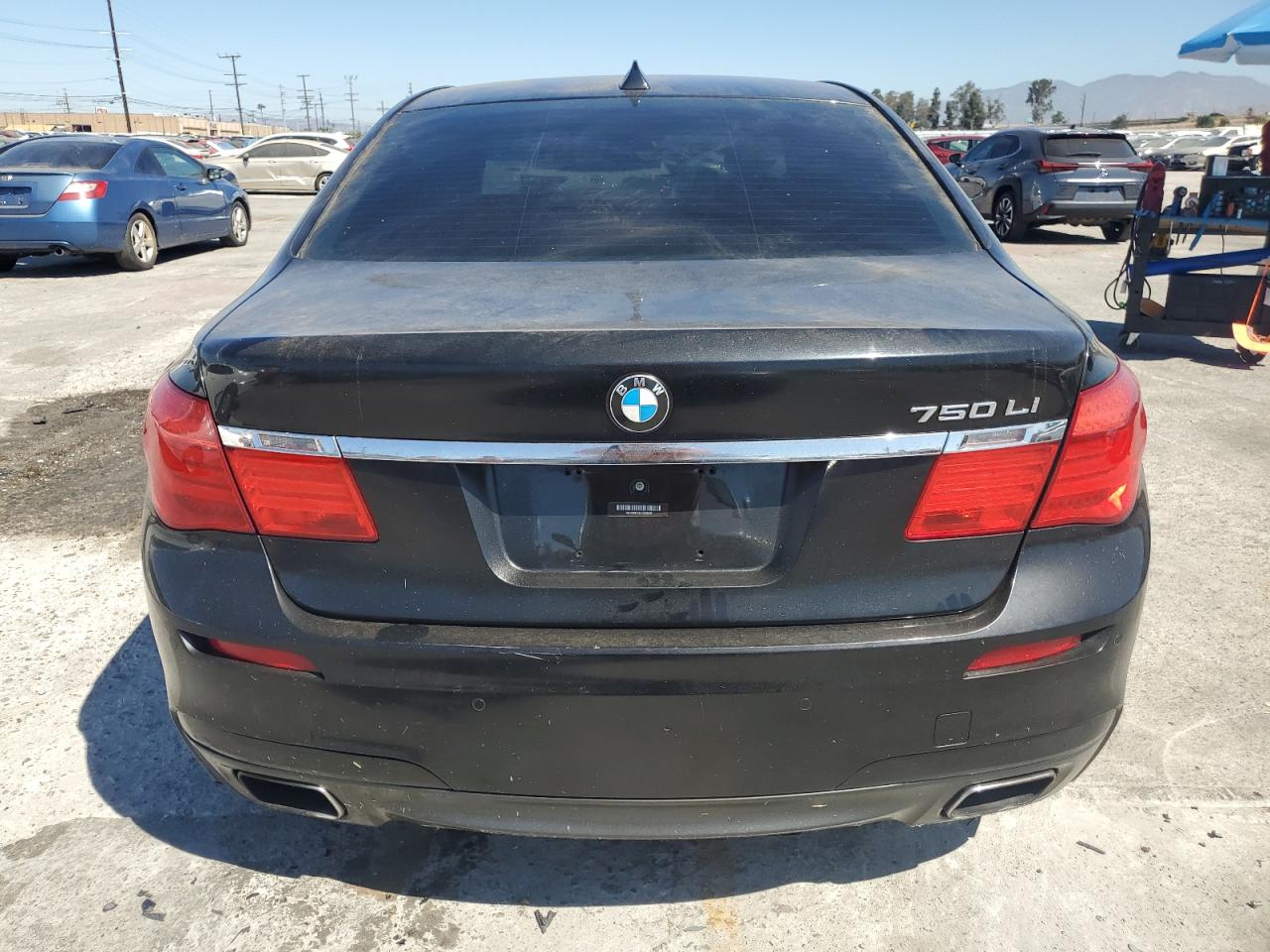 2012 BMW 750 Li VIN: WBAKB8C58CC963205 Lot: 61943225
