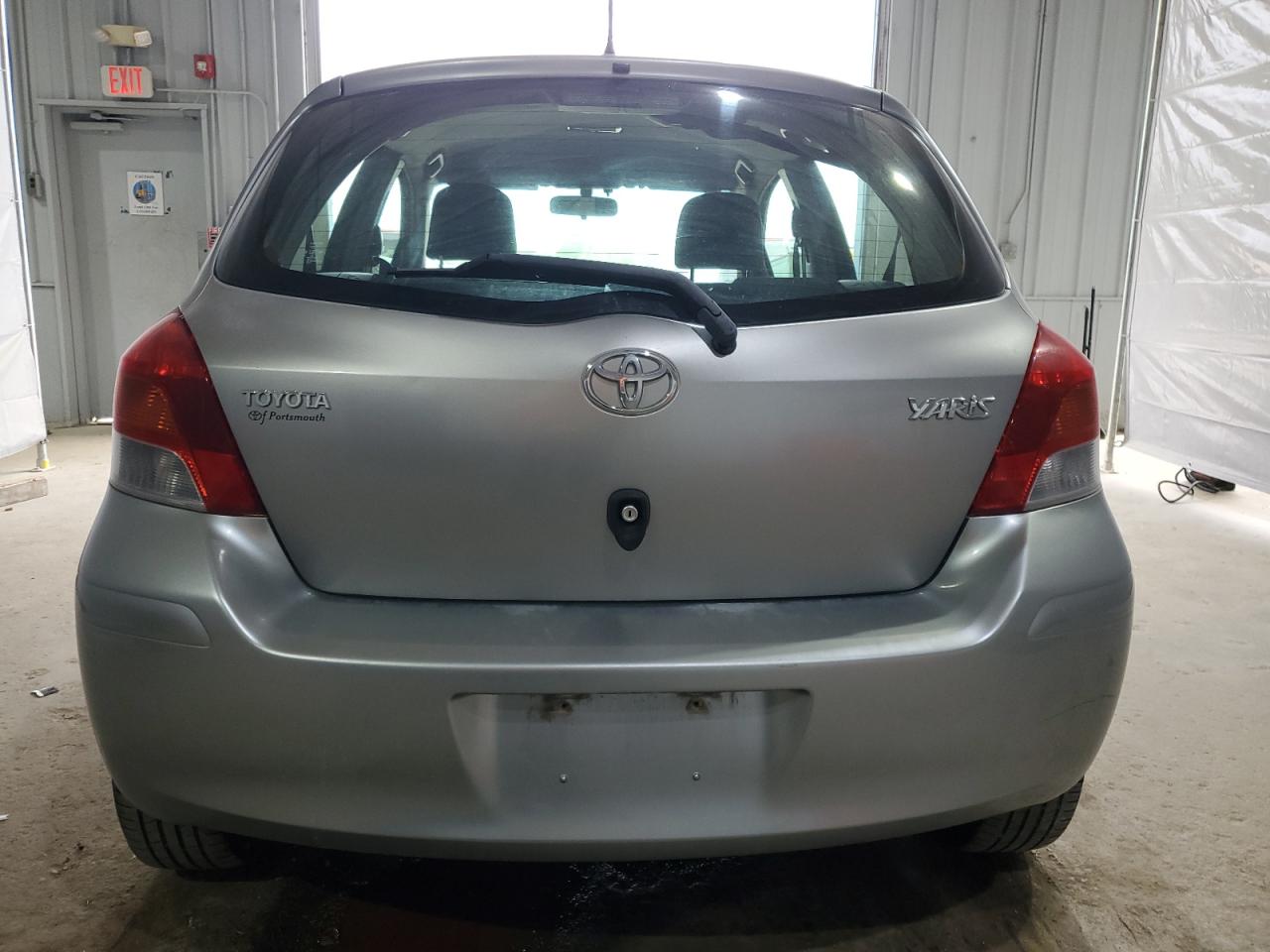 2009 Toyota Yaris VIN: JTDKT903595236464 Lot: 62117405