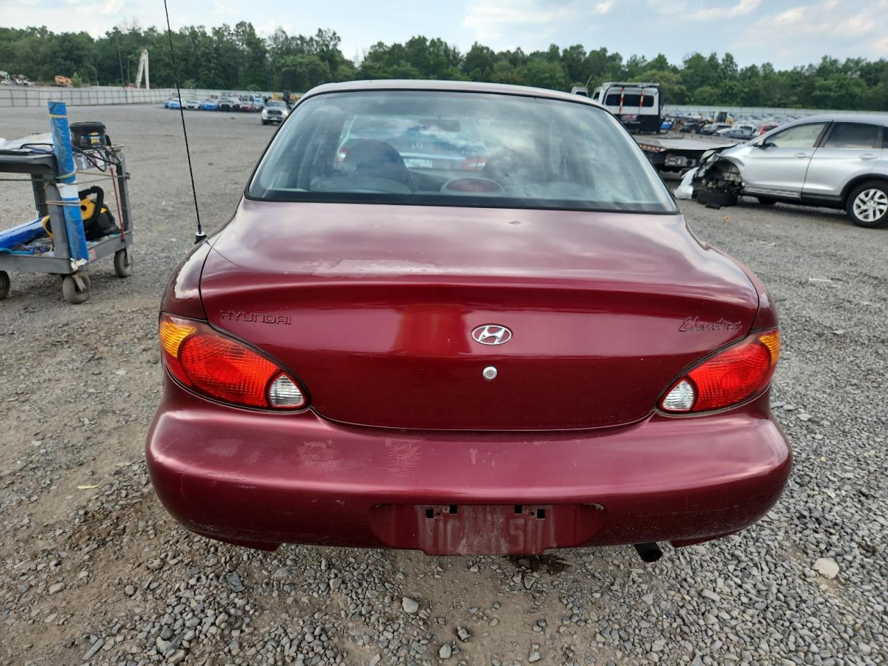 1999 Hyundai Elantra Base VIN: KMHJF25F6XU833540 Lot: 63153215