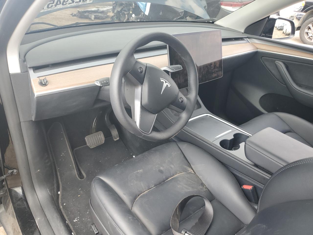 2023 Tesla Model Y VIN: 7SAYGDEE9PF830985 Lot: 62294575