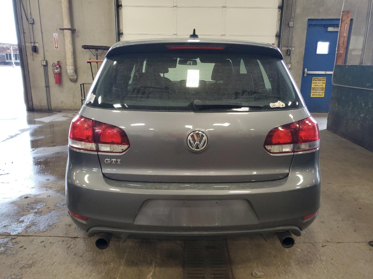 2011 Volkswagen Gti VIN: WVWEV7AJXBW028556 Lot: 62428855