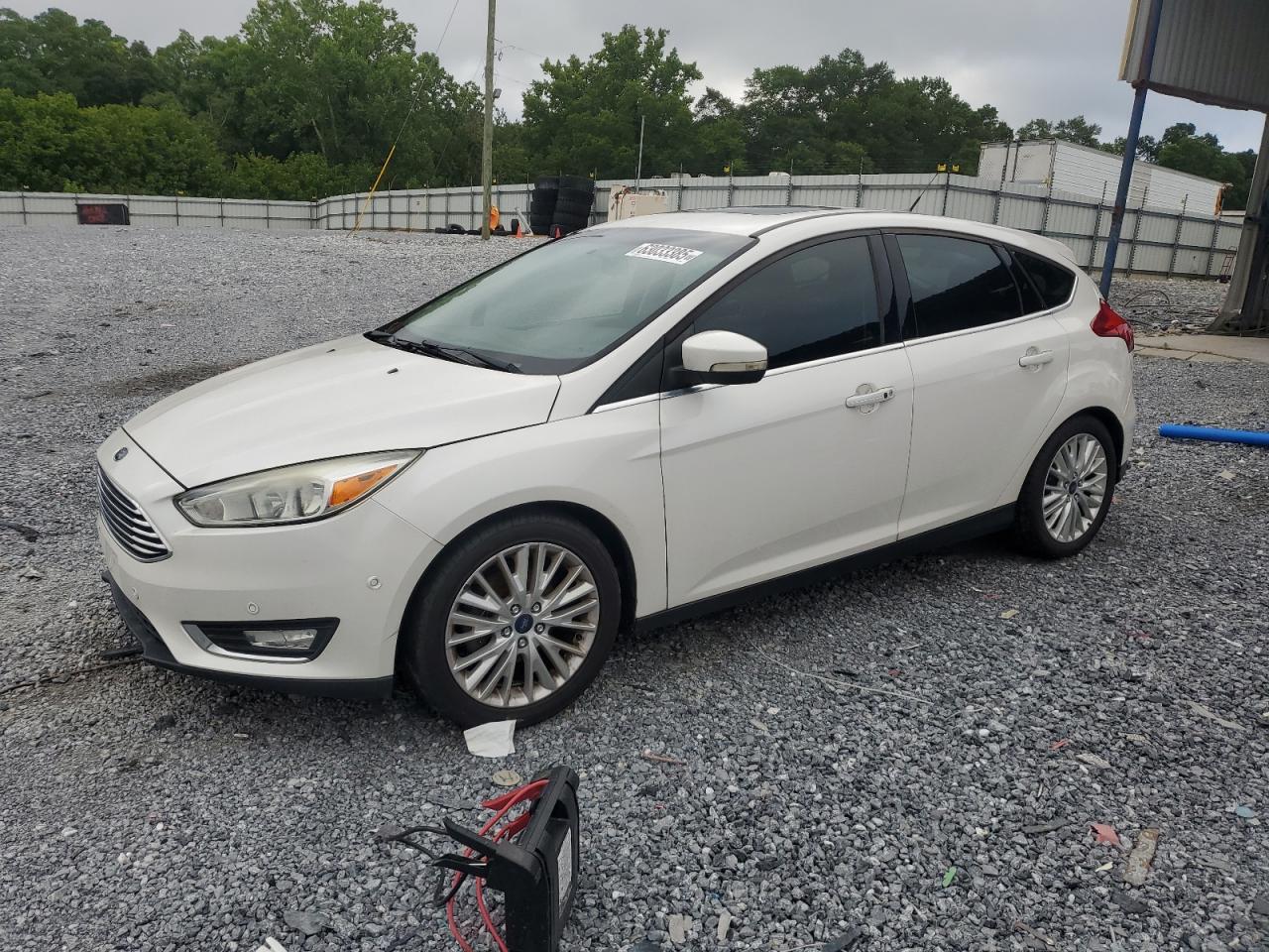 2016 Ford Focus Titanium VIN: 1FADP3N22GL292399 Lot: 63033385