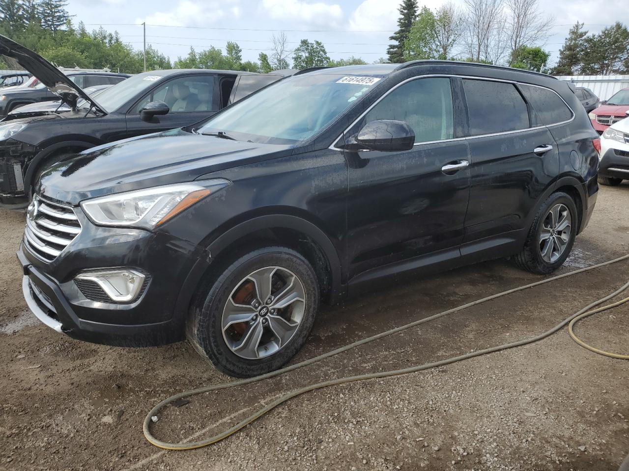 KM8SM4HF2GU160909 HYUNDAI SANTA FE Photo 1