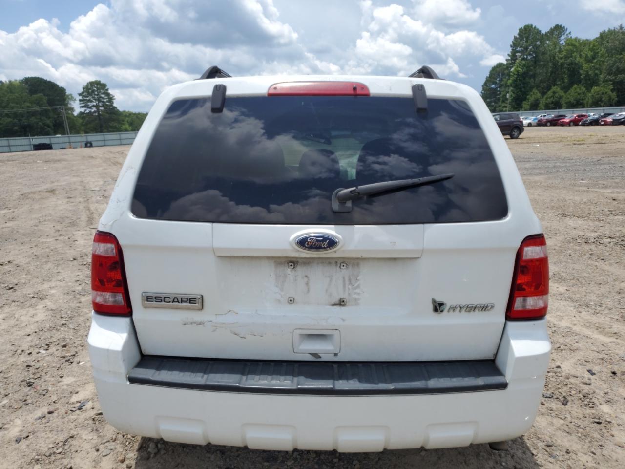 2010 Ford Escape Hybrid VIN: 1FMCU5K33AKA07743 Lot: 63009965