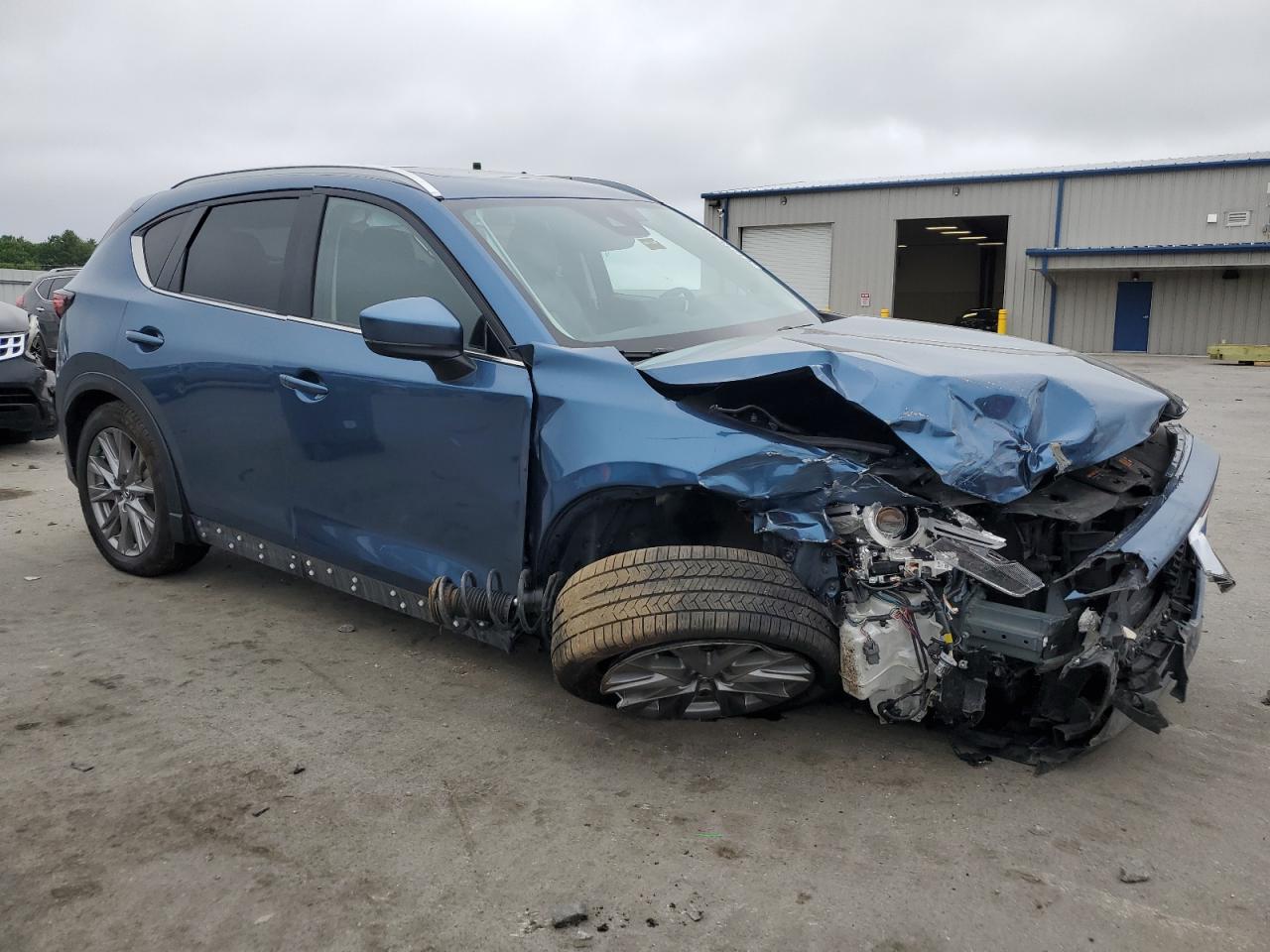 2021 Mazda Cx-5 Grand Touring VIN: JM3KFBDMXM1303701 Lot: 61218225
