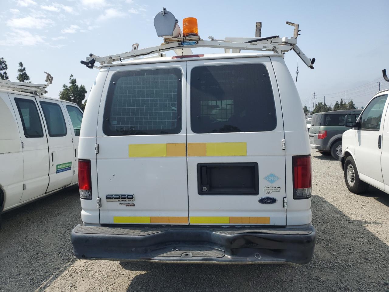 2011 Ford Econoline E350 Super Duty Van VIN: 1FTSE3EL4BDA10234 Lot: 58527455