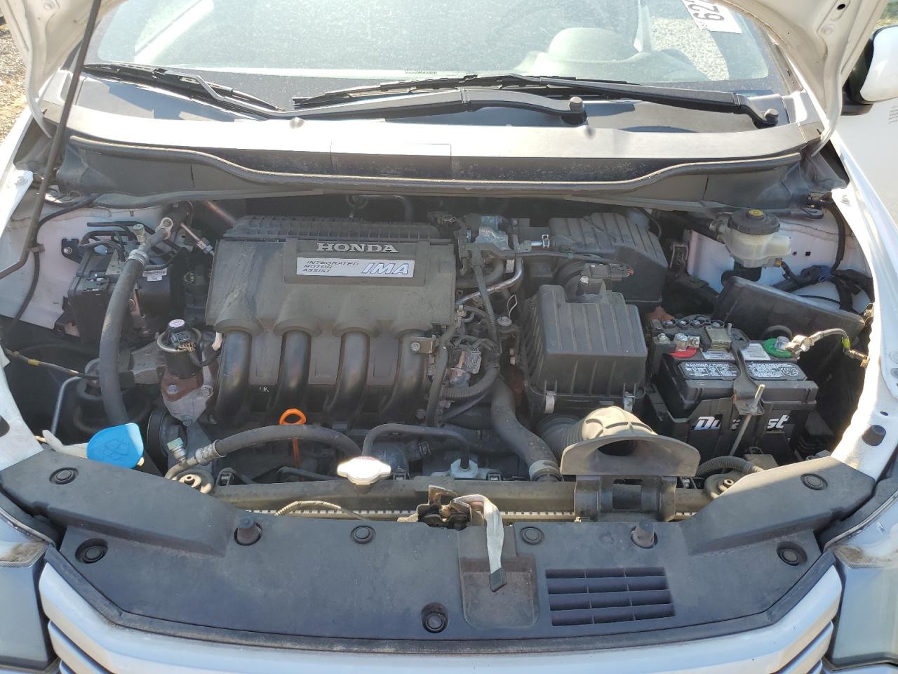 2011 Honda Insight Ex VIN: JHMZE2H7XBS001765 Lot: 62264925