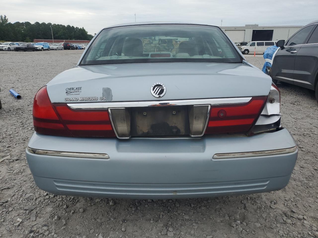 2003 Mercury Grand Marquis Gs VIN: 2MEFM74W23X713170 Lot: 62171315