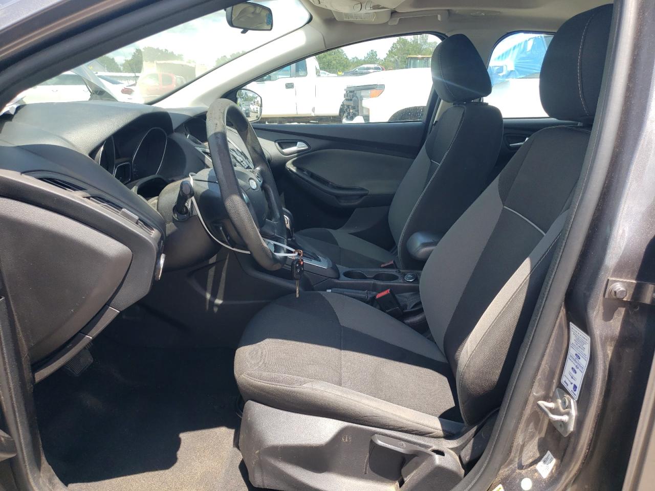 2014 Ford Focus Se VIN: 1FADP3F24EL203086 Lot: 62996615