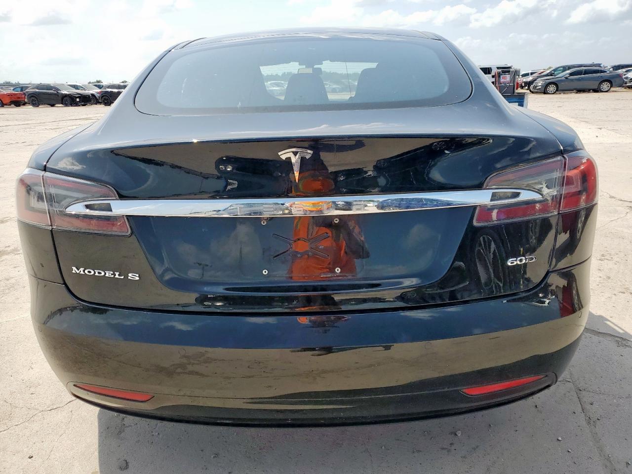 2016 Tesla Model S VIN: 5YJSA1E21GF168439 Lot: 60703035