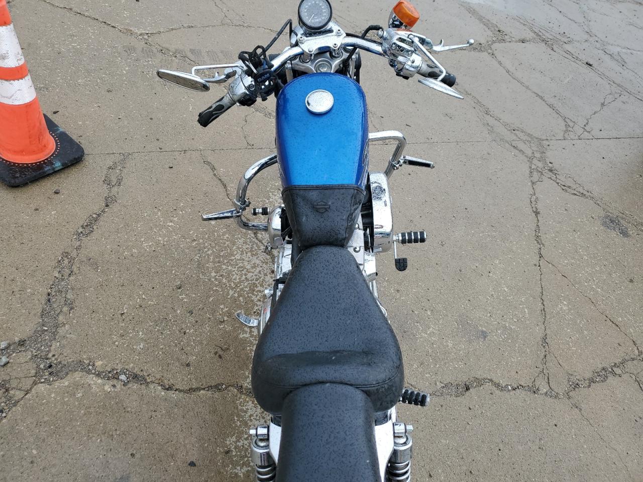 1997 Harley-Davidson Xl883 Hugger VIN: 1HD4CEM11VY215290 Lot: 60394925