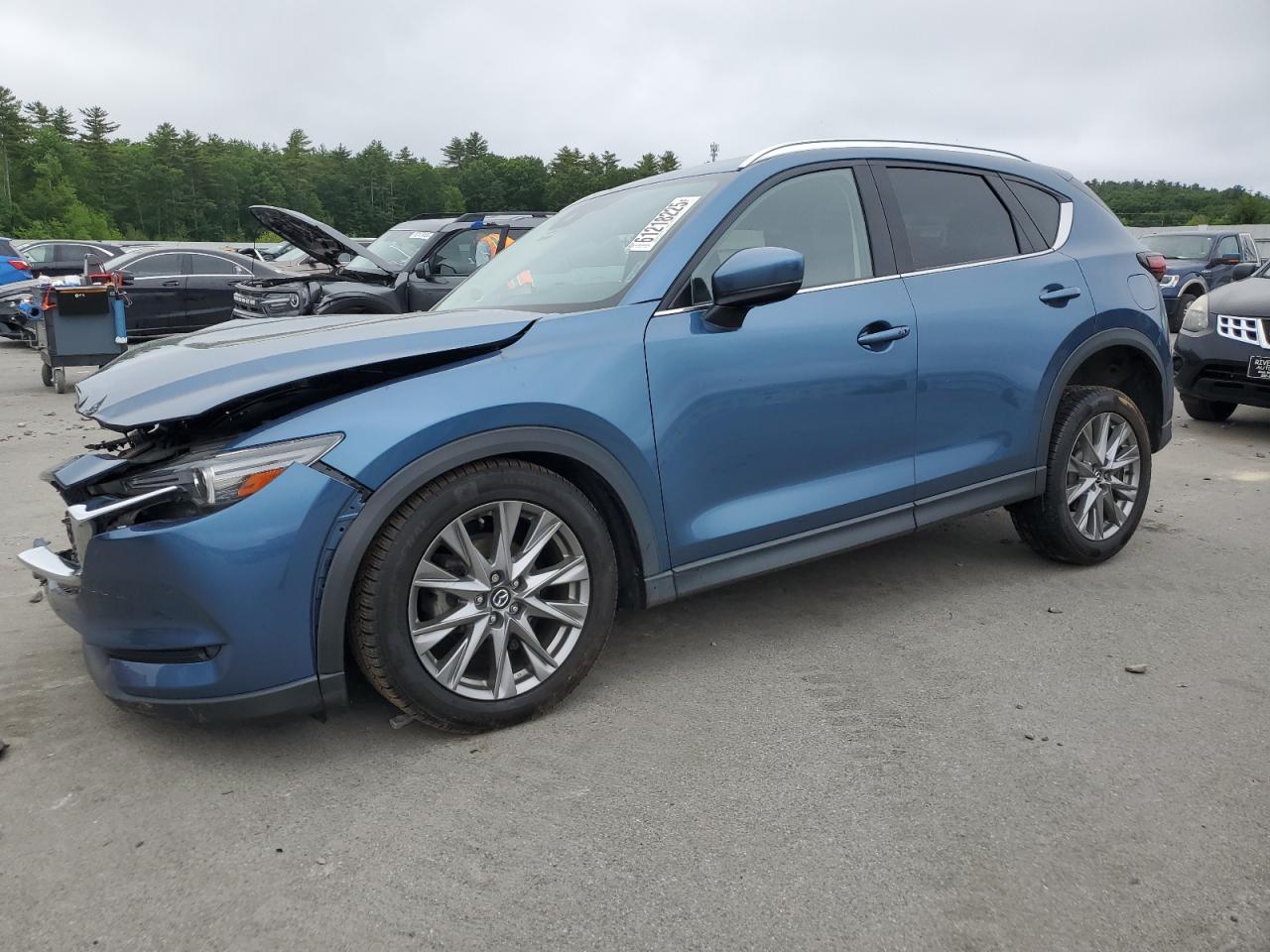 2021 Mazda Cx-5 Grand Touring VIN: JM3KFBDMXM1303701 Lot: 61218225