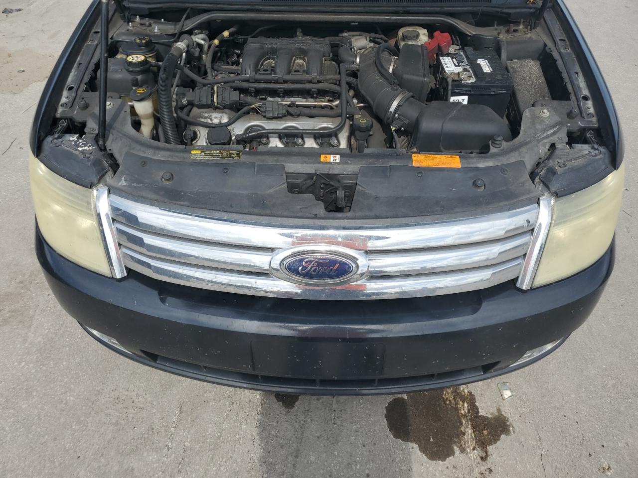2008 Ford Taurus Limited VIN: 1FAHP25W78G128851 Lot: 61254015