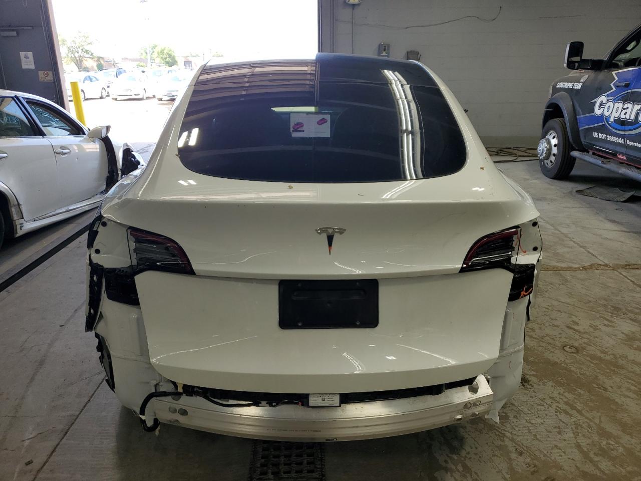 TESLA MODEL Y 2024 VIN 7SAYGDEDXRF210303 фото 6